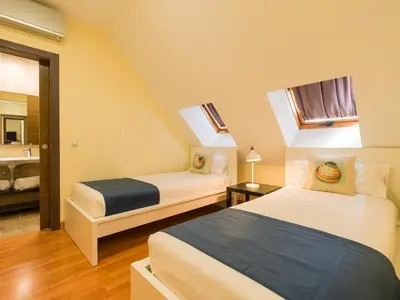 Cama o camas de una habitación en City Family Tomas Miller