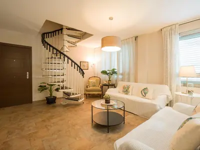 Zona de estar de City Family Tomas Miller