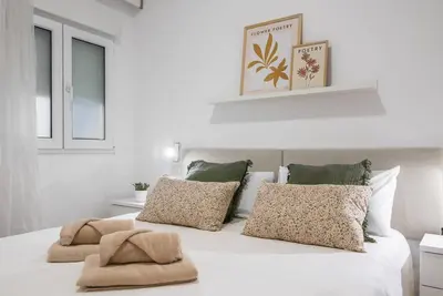 Cama o camas de una habitación en Alma Home ,6 paxs ,Wifi , Playa Canteras, Ocio