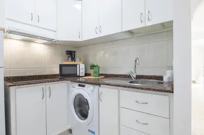 Una cocina o zona de cocina en Apartamento frente a la playa de Las Canteras C68