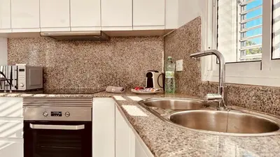 Una cocina o zona de cocina en Click & Guest -Terrace with Sea and Mountain Views