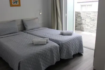 Cama o camas de una habitación en VV Alcaravaneras Ático A