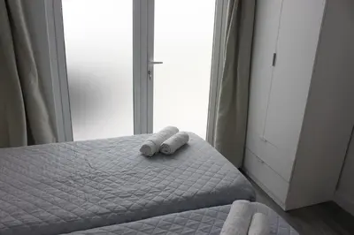 Cama o camas de una habitación en VV Alcaravaneras Ático A