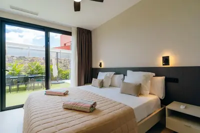 Cama o camas de una habitación en Villa Calima by Homestaygrancanaria