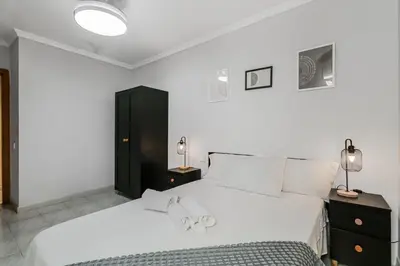 Cama o camas de una habitación en Flat Triana