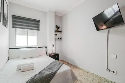 Cama o camas de una habitación en Flat Triana