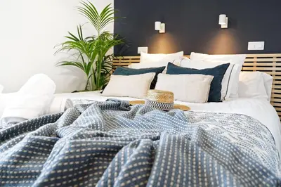 Cama o camas de una habitación en Amapola Coast - recién reformado, frente a la playa