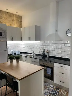 Una cocina o zona de cocina en Apartamentos Los Dragos - Planta 1
