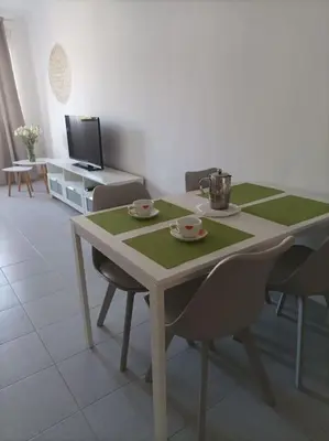 Una televisión o centro de entretenimiento en Maretejas-2 bedroom Playa de Arinaga
