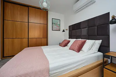 Cama o camas de una habitación en APARTMENT FLAMINGO