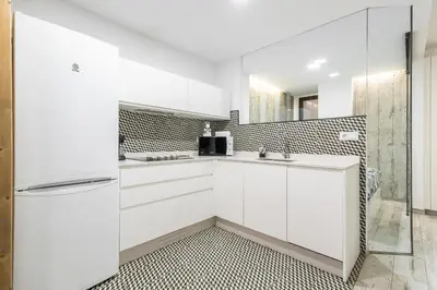 Una cocina o zona de cocina en Home2Book Cozy Escape near Las Canteras Beach