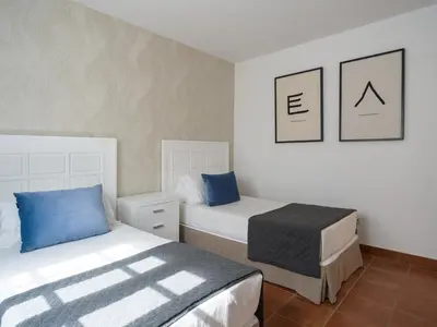 Cama o camas de una habitación en HD Family Suite Holycan II
