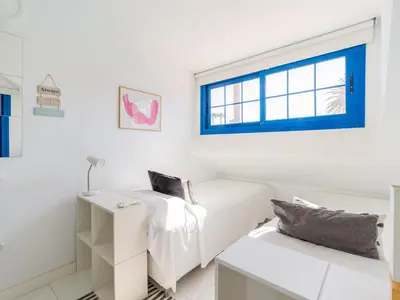 Cama o camas de una habitación en Harbour retreat at the beach by CanaryScape