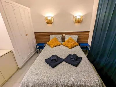 Cama o camas de una habitación en Aloha Playmar Duplex