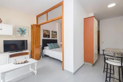 Cama o camas de una habitación en Las Canteras Cozy Apt - 2 min walk to beach