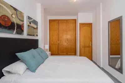 Cama o camas de una habitación en Las Canteras Cozy Apt - 2 min walk to beach