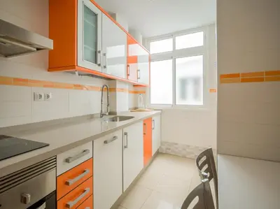 Una cocina o zona de cocina en Moderno piso de 3 habitaciones cerca de Triana