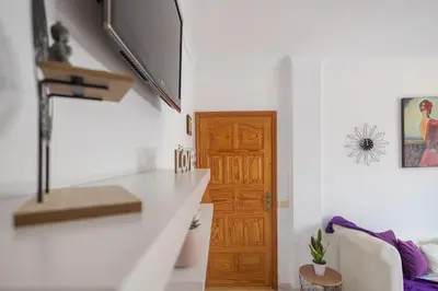 Una televisión o centro de entretenimiento en Apartamento céntrico en Agaete