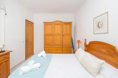 Cama o camas de una habitación en Apartamento céntrico en Agaete