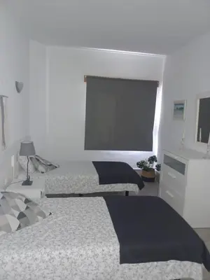 Cama o camas de una habitación en Apartamento con vistas a la playa, Puerto Rico