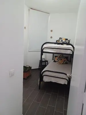 Cama o camas de una habitación en Apartamento con vistas a la playa, Puerto Rico