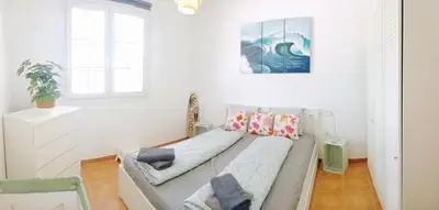 Cama o camas de una habitación en Piso magico junto al mar con gran terraza