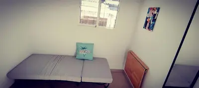 Cama o camas de una habitación en Piso magico junto al mar con gran terraza