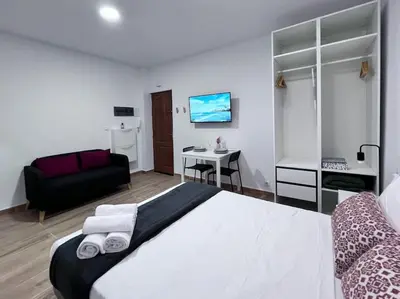 Cama o camas de una habitación en Riquiño-Estudio playa Canteras