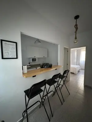 Una cocina o zona de cocina en HostJimeno Beach