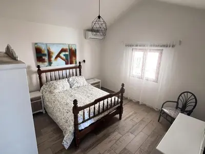 Cama o camas de una habitación en Vivelorural Abuela María 2, a place for families