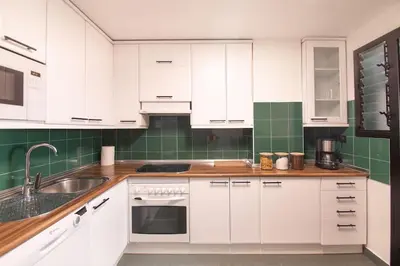 Una cocina o zona de cocina en Las Vistas Residencial l Parking Privado