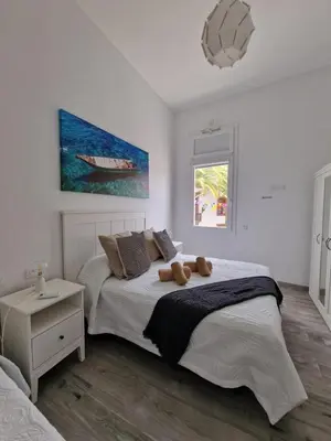 Cama o camas de una habitación en Alojamientos Agaete Pueblo Nº13