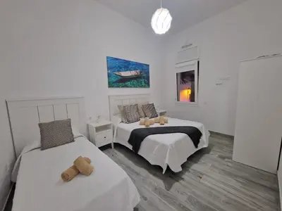 Cama o camas de una habitación en Alojamientos Agaete Pueblo Nº13