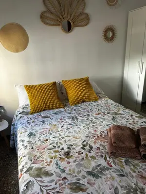 Cama o camas de una habitación en Palmara Las Canteras alquiler por habitación