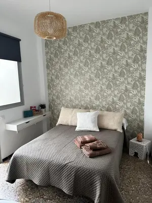 Cama o camas de una habitación en Palmara Las Canteras alquiler por habitación