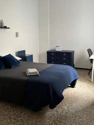 Cama o camas de una habitación en Palmara Las Canteras alquiler por habitación