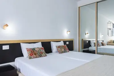 Cama o camas de una habitación en Paradise Playa del Cura