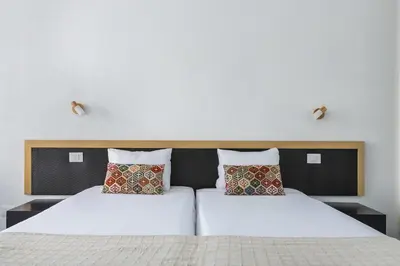Cama o camas de una habitación en Paradise Playa del Cura