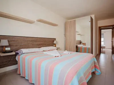 Cama o camas de una habitación en Apartamento Colón by Villas Rivero