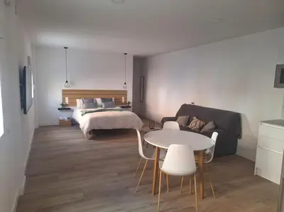 Cama o camas de una habitación en La esquina de Miguel