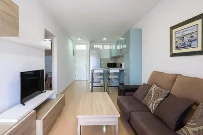 Una televisión o centro de entretenimiento en Sol y Playa III