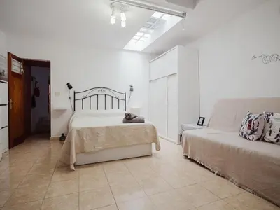 Cama o camas de una habitación en Ruta del Perenquén by Villas Rivero