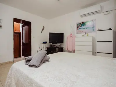 Una televisión o centro de entretenimiento en Ruta del Perenquén by Villas Rivero