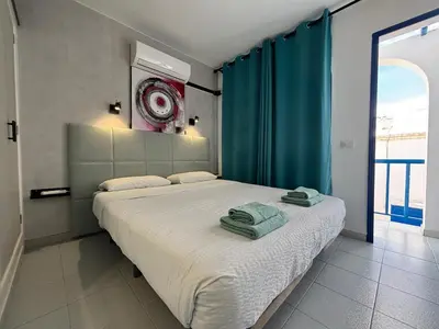 Cama o camas de una habitación en Canarian Elisabeth Home by lucaproperties grancanaria
