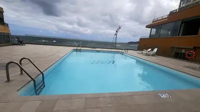 Piscina en o cerca de Vivienda vacacional en primera linea de playa y vistas al Mar y Piscina