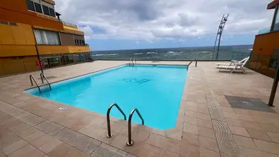 Piscina en o cerca de Vivienda vacacional en primera linea de playa y vistas al Mar y Piscina