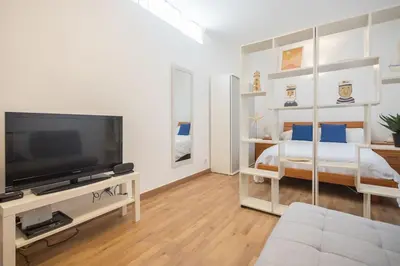 Cama o camas de una habitación en Estudio en primera línea de playa