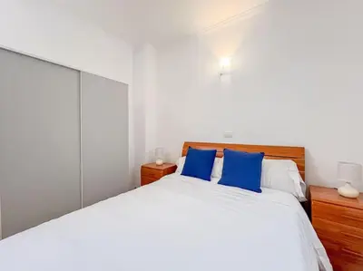 Cama o camas de una habitación en Estudio en primera línea de playa