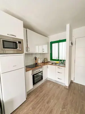 Una cocina o zona de cocina en Cozy apt pool&tennis