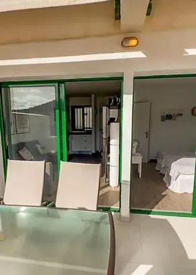 Cama o camas de una habitación en Cozy apt pool&tennis